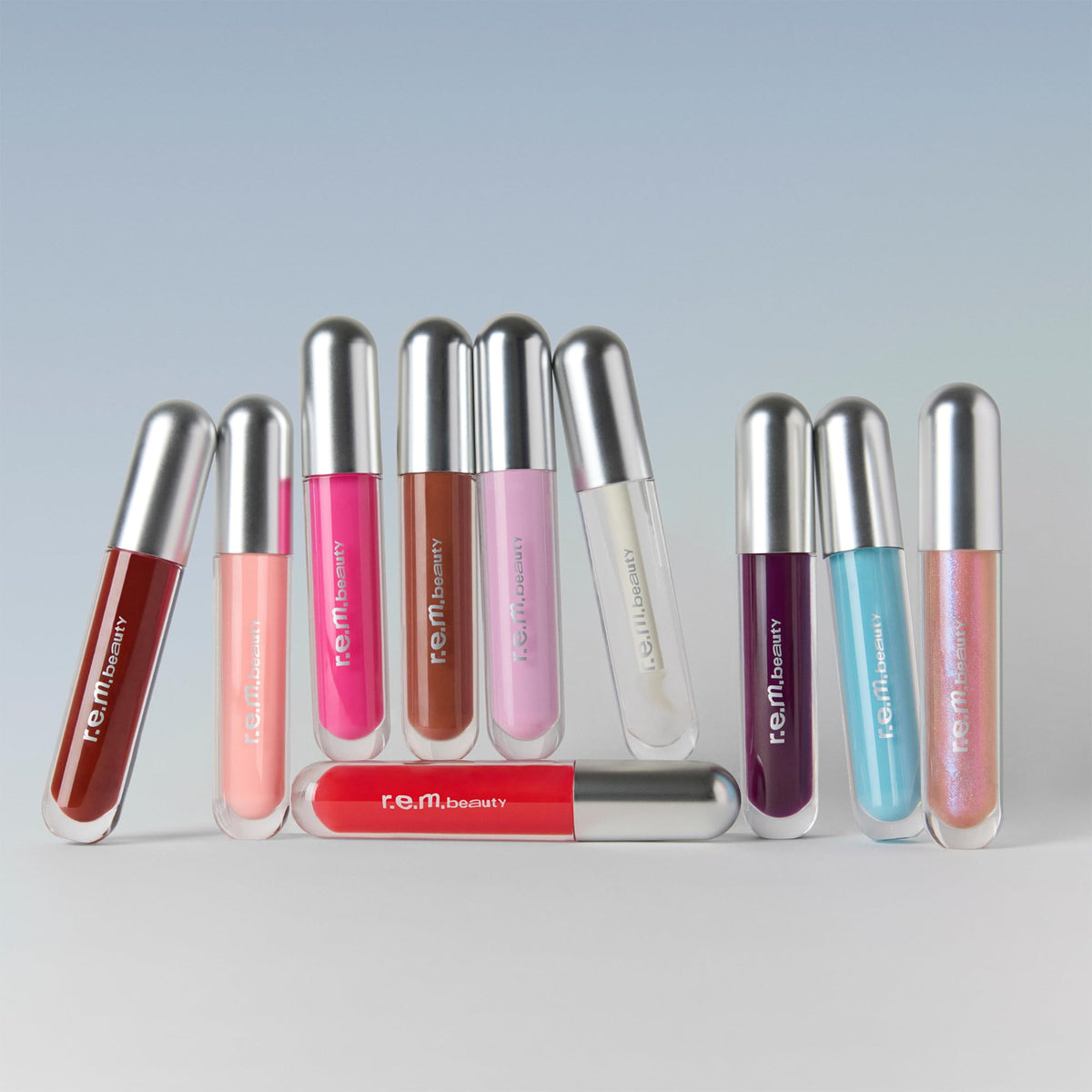 r.e.m. beauty by ariana grande | Fembot Essential Drip Glossy Balm