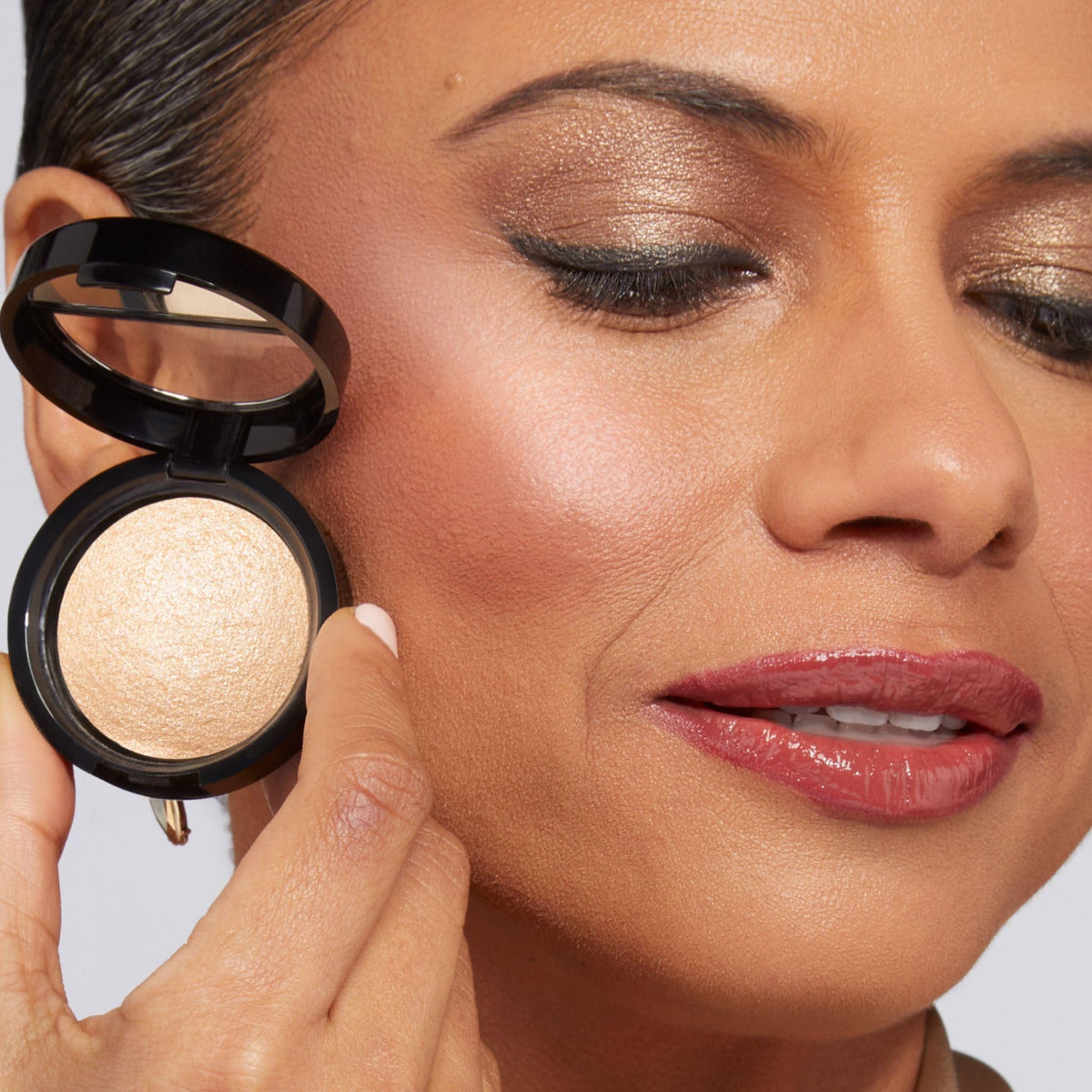 LAURA GELLER Baked Travel Size Illuminating Highlighter - Portofino